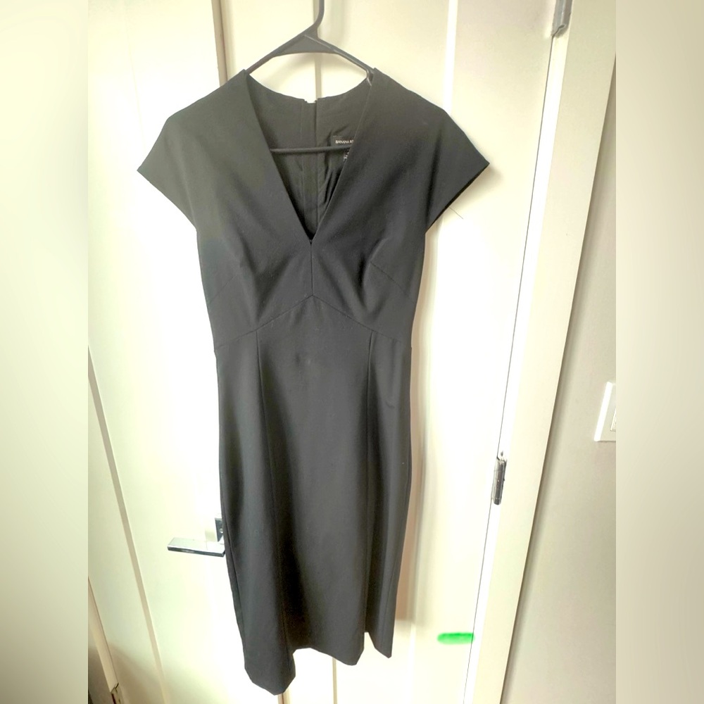 4 tall. J. Crew Black dress with gold zipper!